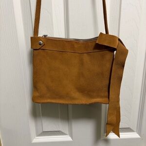 Zara 100% suede leather Tan brown crossbody purse with bow detail 7”x9”